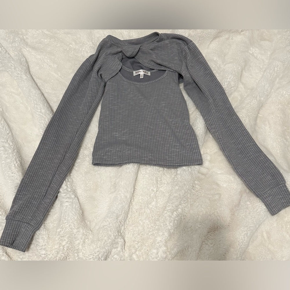 Gray tank top with long sleeve 2nd layer, never worn,comfortable,and size small.